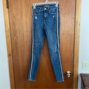 Wild fable woman’s skinny jeans size 00/24R vertical stripe ripped knee‎